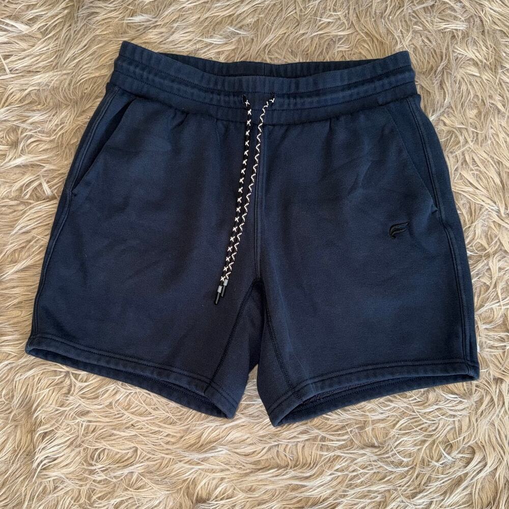 Fabletics Men’s the Postgame Shorts Black 7” size L